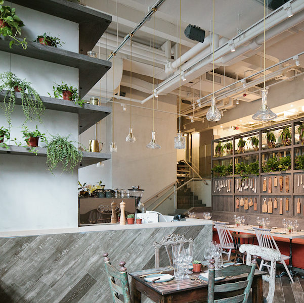 Greenery, wood, brass and rustic design at Grassroots Pantry